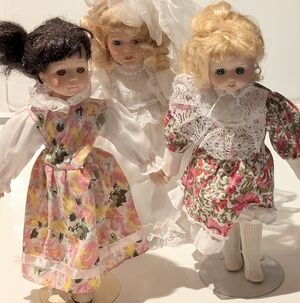 Porcelain Doll Lot of 3 with Stands, One Bride